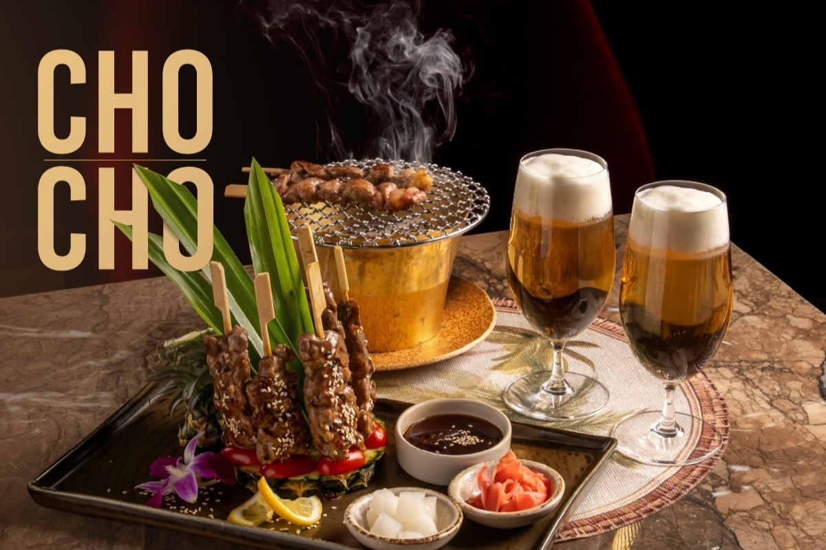 Cho Cho Set featuring hibachi-grilled teriyaki beef skewers served with two chilled beers at Pacifico Restaurant & Bar.